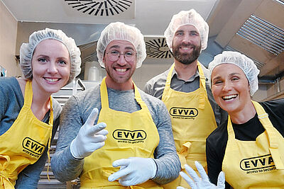Photo of EVVA team cooking at the "Gruft"
